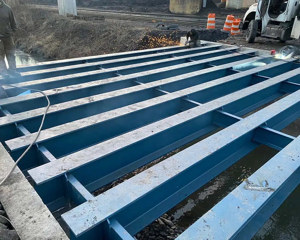 Anchoring Bridge Sections into Concrete Footer